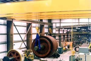 Two 35-ton, 80 foot double girder cranes are used for precise placement of large equipment at this rewinding and repair facility for heavy duty industrial equipment. One crane also has a 20 ton auxiliary hoist to help rotate loads