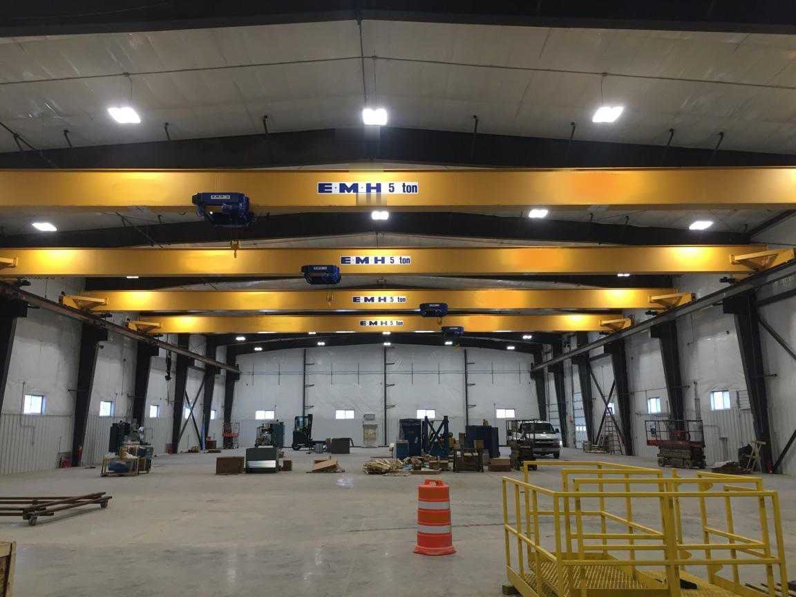 Four ELK cranes with 91 foot span at a manufacturer of sports venue bleachers